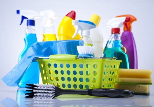 Bermondsey cleaners discussing transparent pricing for a flat clearance