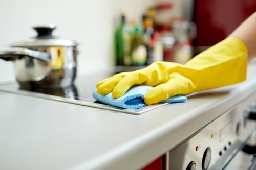 Deep cleaning a fabric sofa with professional equipment